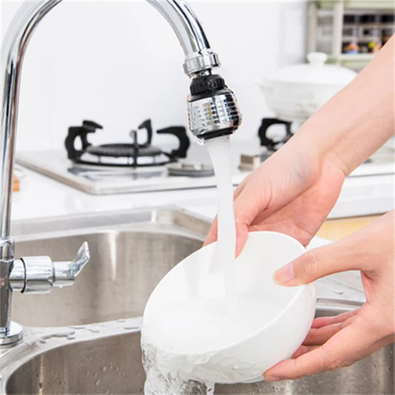 Flexible faucet extension with 360-degree rotation, allowing adjustable water flow direction for enhanced sink accessibility