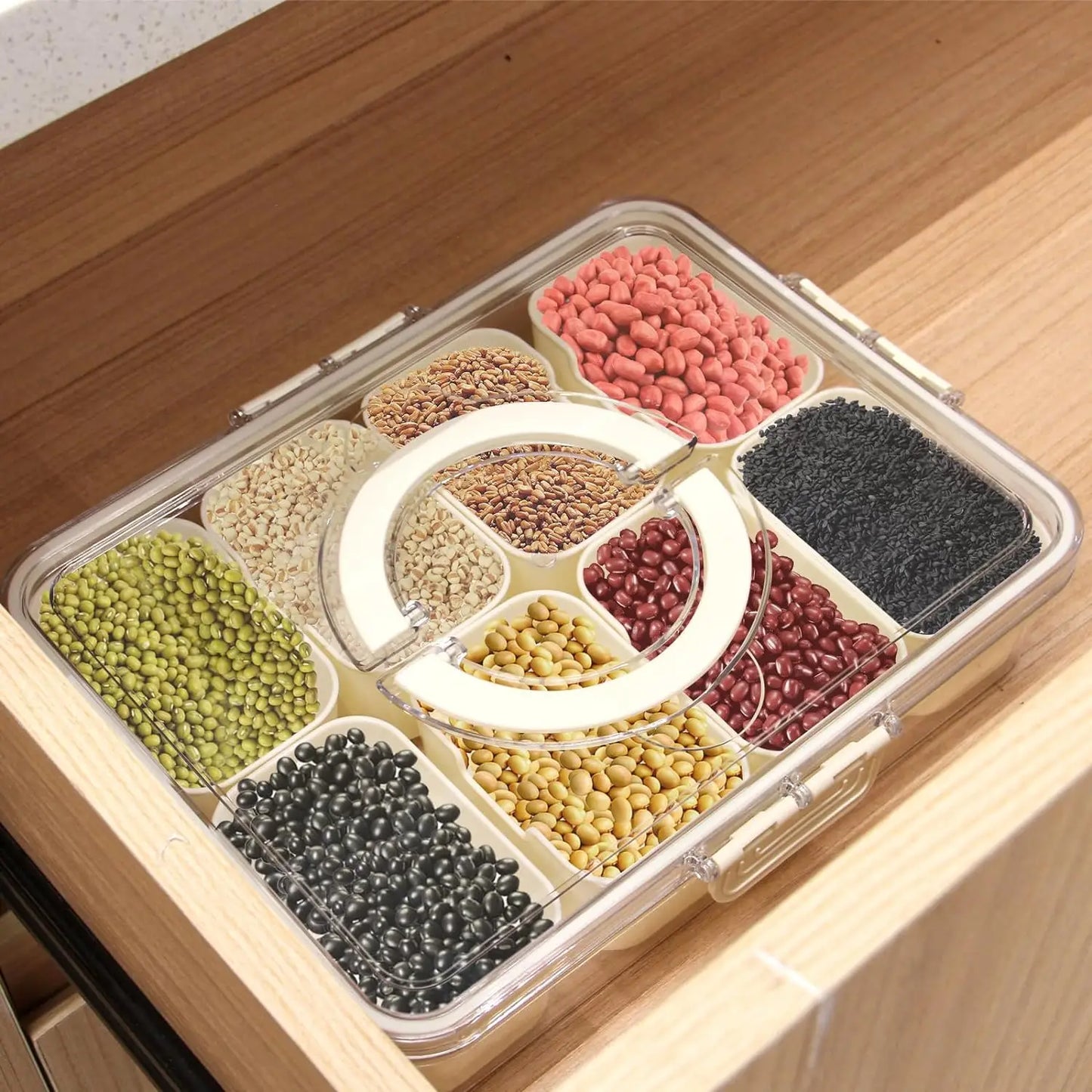 A divided serving tray storage box featuring multiple compartments, a secure lid, and a handle for easy portability; ideal for organizing and transporting snacks, fruits, nuts, or appetizers during events, picnics, or daily use