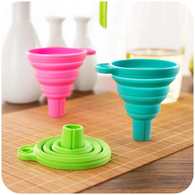 A foldable funnel, also known as a collapsible funnel, is a kitchen tool designed to assist in transferring liquids or powders into containers with small openings. Made from flexible materials like silicone, these funnels can be expanded for use and collapsed for convenient storage, making them space-efficient and practical for various kitchen tasks