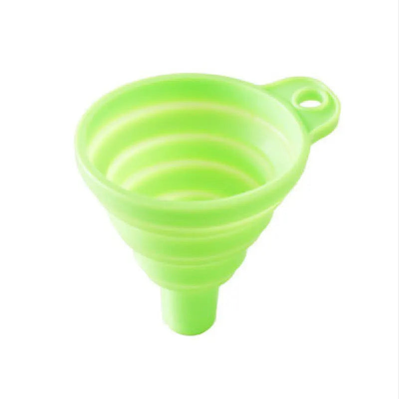 A foldable, collapsible silicone funnel in teal, designed for easy transfer of liquids and powders into bottles or containers. Made from food-grade, BPA-free silicone, it is heat-resistant, durable, and folds flat for convenient storage.