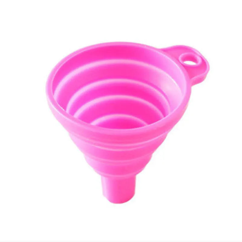 A foldable, collapsible silicone funnel in teal, designed for easy transfer of liquids and powders into bottles or containers. Made from food-grade, BPA-free silicone, it is heat-resistant, durable, and folds flat for convenient storage.
