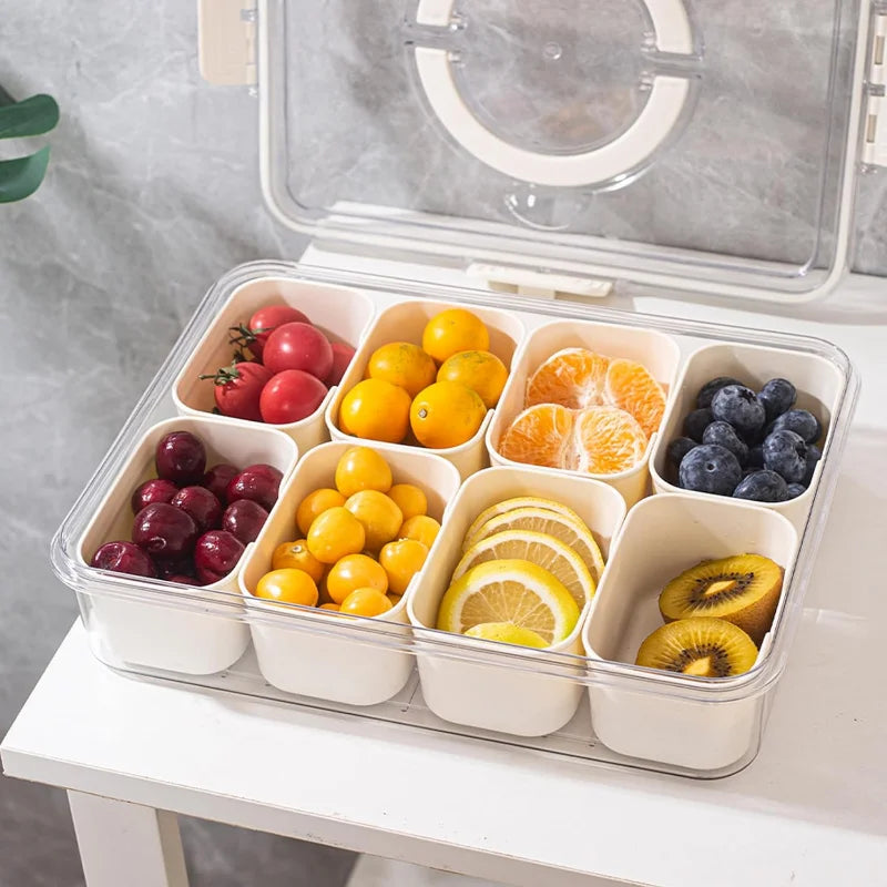 A divided serving tray storage box featuring multiple compartments, a secure lid, and a handle for easy portability; ideal for organizing and transporting snacks, fruits, nuts, or appetizers during events, picnics, or daily use