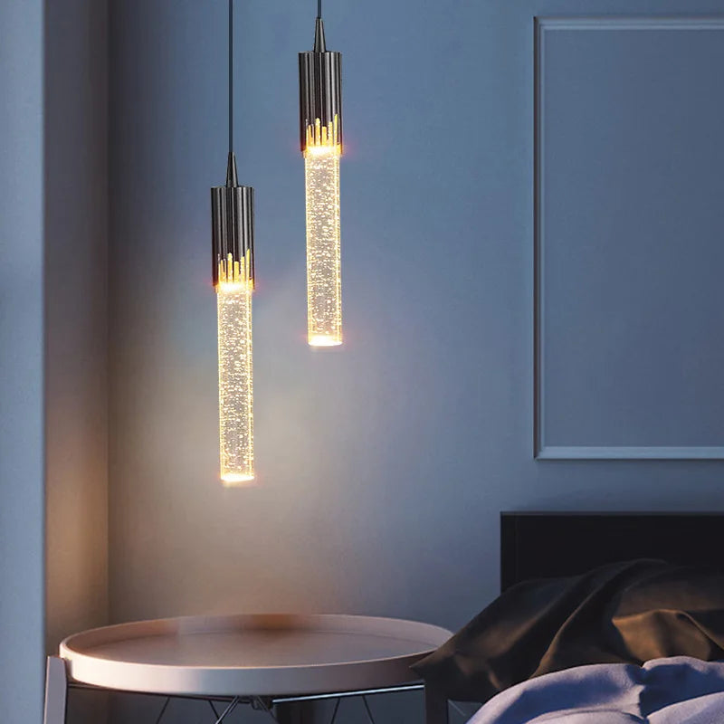 A modern luxury crystal pendant lamp featuring elegant crystal elements suspended from a sleek, contemporary fixture. Designed to add sophistication and glamour to any space, this lamp combines high-quality materials with innovative design, making it a striking focal point in both modern and traditional interiors