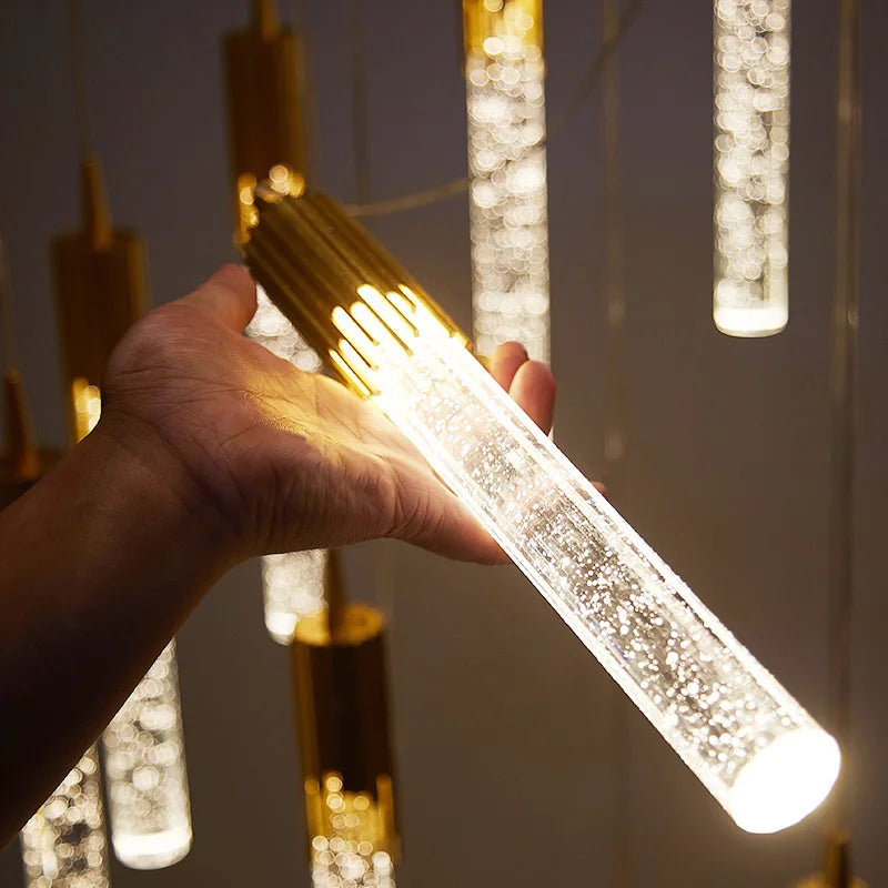 A modern luxury crystal pendant lamp featuring elegant crystal elements suspended from a sleek, contemporary fixture. Designed to add sophistication and glamour to any space, this lamp combines high-quality materials with innovative design, making it a striking focal point in both modern and traditional interiors