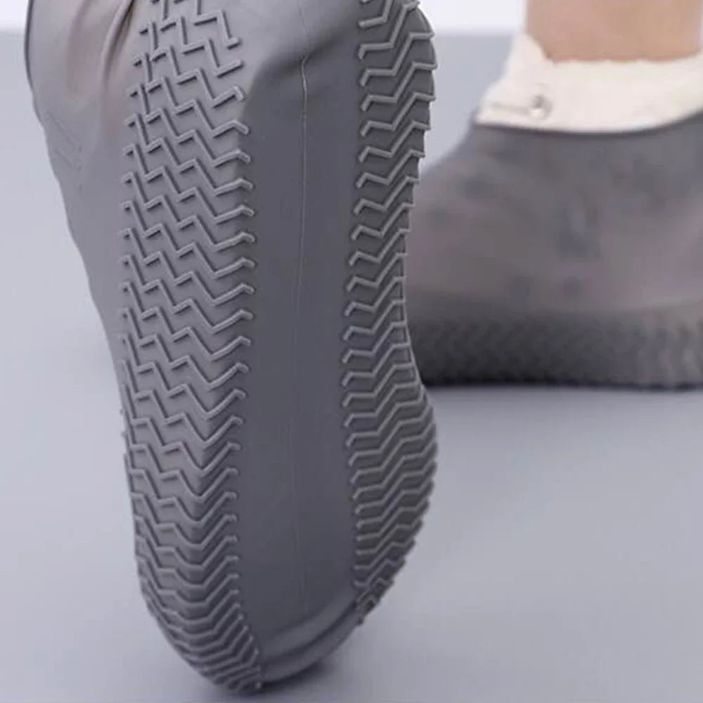 Reusable waterproof shoe covers made from durable, flexible silicone, designed to fit over various shoe sizes; feature non-slip soles for enhanced safety; easy to clean and store; ideal for protecting shoes from water, mud, and debris during outdoor activities