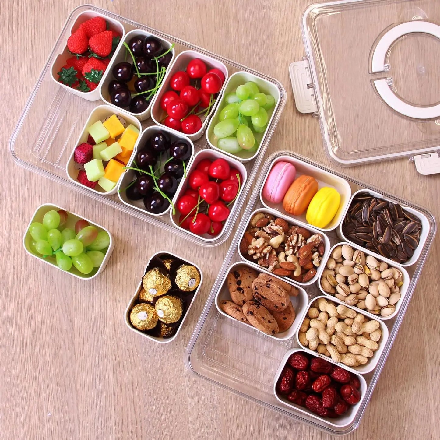 A divided serving tray storage box featuring multiple compartments, a secure lid, and a handle for easy portability; ideal for organizing and transporting snacks, fruits, nuts, or appetizers during events, picnics, or daily use