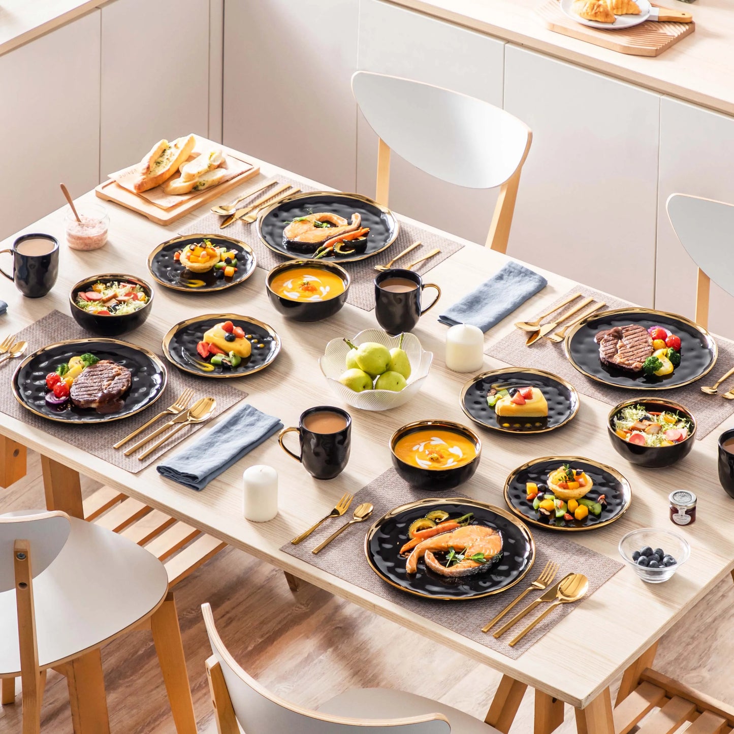 A sophisticated black porcelain dinnerware set featuring elegant gold trim accents. This set typically includes dinner plates, salad plates, bowls, and mugs, all crafted from high-quality porcelain. The combination of deep black hues with refined gold detailing adds a touch of luxury to both everyday dining and special occasions