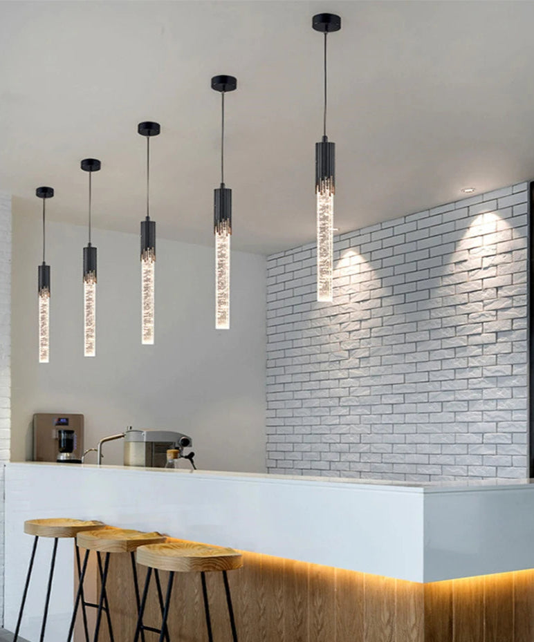 A modern luxury crystal pendant lamp featuring elegant crystal elements suspended from a sleek, contemporary fixture. Designed to add sophistication and glamour to any space, this lamp combines high-quality materials with innovative design, making it a striking focal point in both modern and traditional interiors