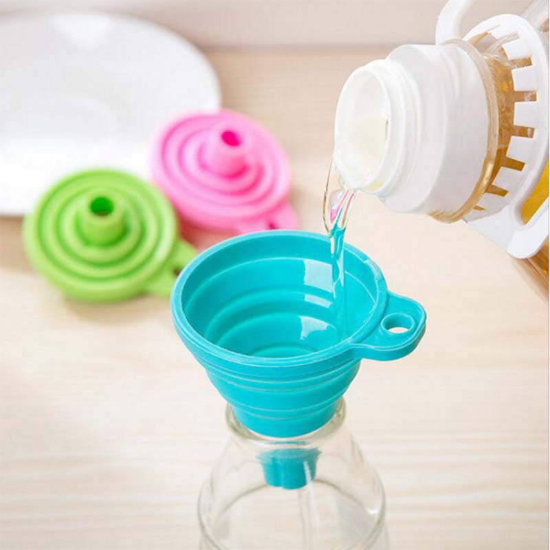 A foldable funnel, also known as a collapsible funnel, is a kitchen tool designed to assist in transferring liquids or powders into containers with small openings. Made from flexible materials like silicone, these funnels can be expanded for use and collapsed for convenient storage, making them space-efficient and practical for various kitchen tasks