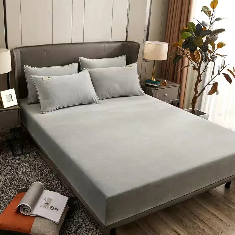 A fitted sheet with elastic edges designed to snugly cover a mattress, ensuring a smooth and secure fit that prevents shifting during use. Made from soft, breathable fabric, this sheet enhances sleeping comfort while protecting the mattress from dust and stains