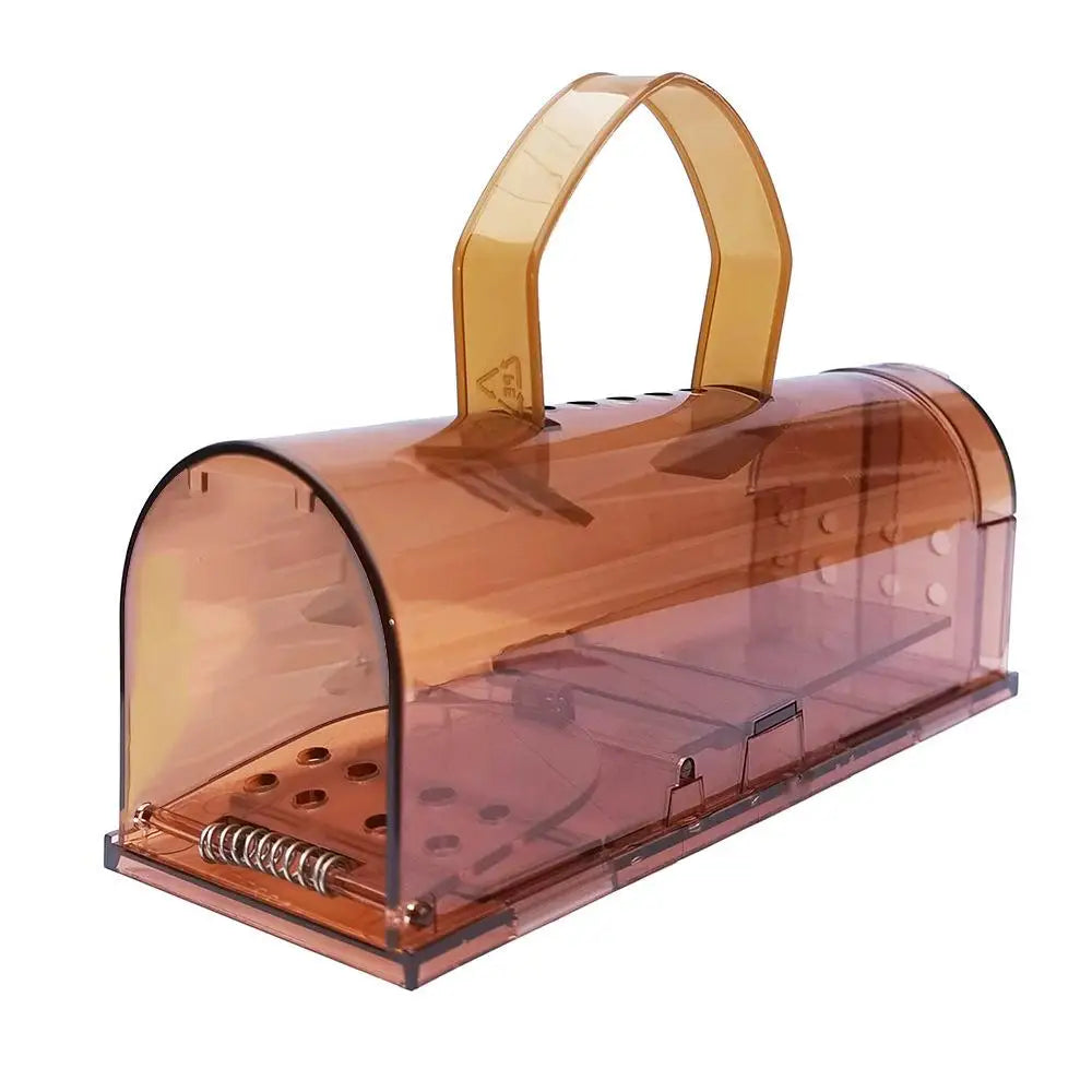 A humane mouse trap designed to safely capture and release mice without harm. The transparent plastic construction allows for easy monitoring, and ventilation holes ensure the mouse's well-being until release