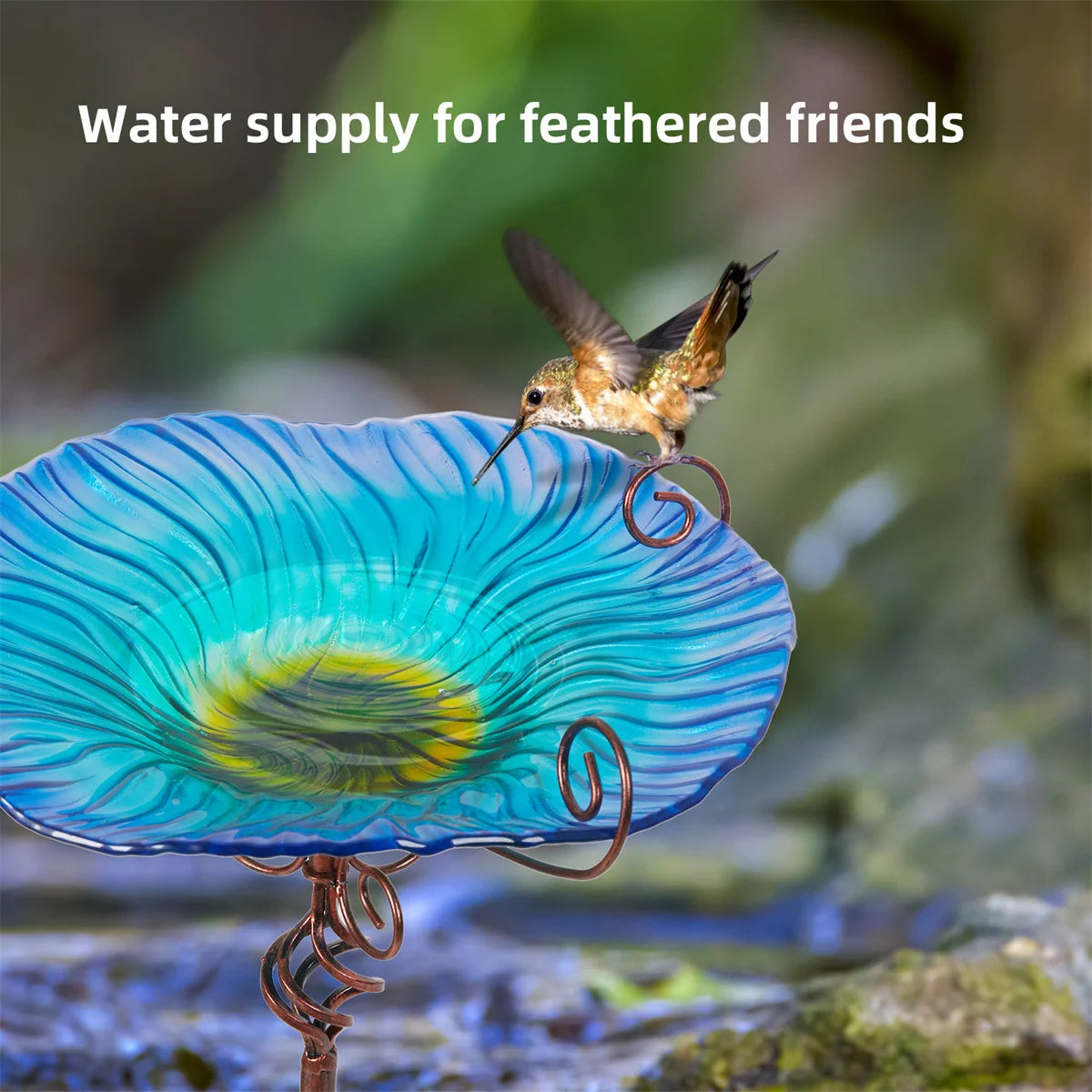 A decorative garden birdbath featuring a glass bowl with a flower design, mounted on a tall pedestal. The vibrant colors and intricate patterns attract birds while adding a touch of elegance to outdoor spaces.