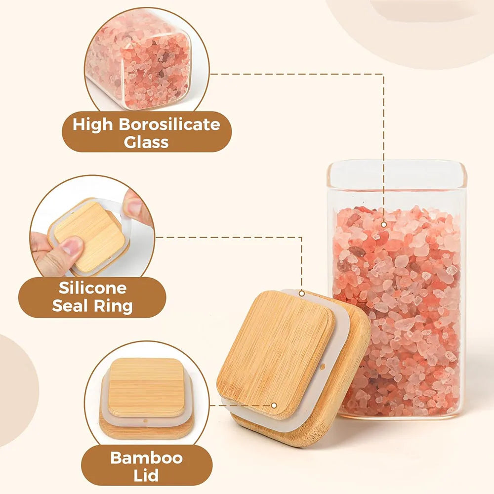 Set of glass spice jars with bamboo lids, offering a stylish and eco-friendly storage solution. Perfect for organizing and preserving spices, herbs, or other kitchen essentials.