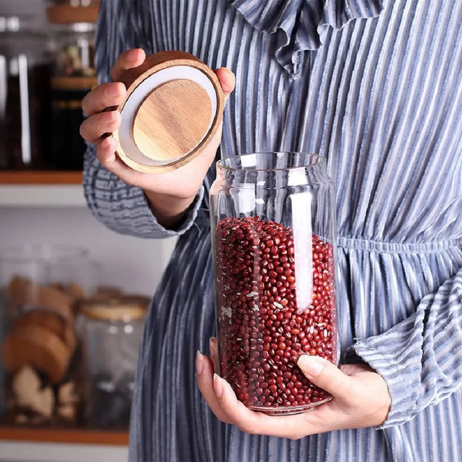A collection of clear glass storage jars with airtight lids, ideal for organizing and preserving various kitchen staples such as pasta, grains, spices, and snacks. Their transparent design allows for easy identification of contents, while the airtight seals maintain freshness and prevent moisture intrusion. These jars not only provide practical storage solutions but also add a touch of elegance to kitchen countertops or pantry shelves
