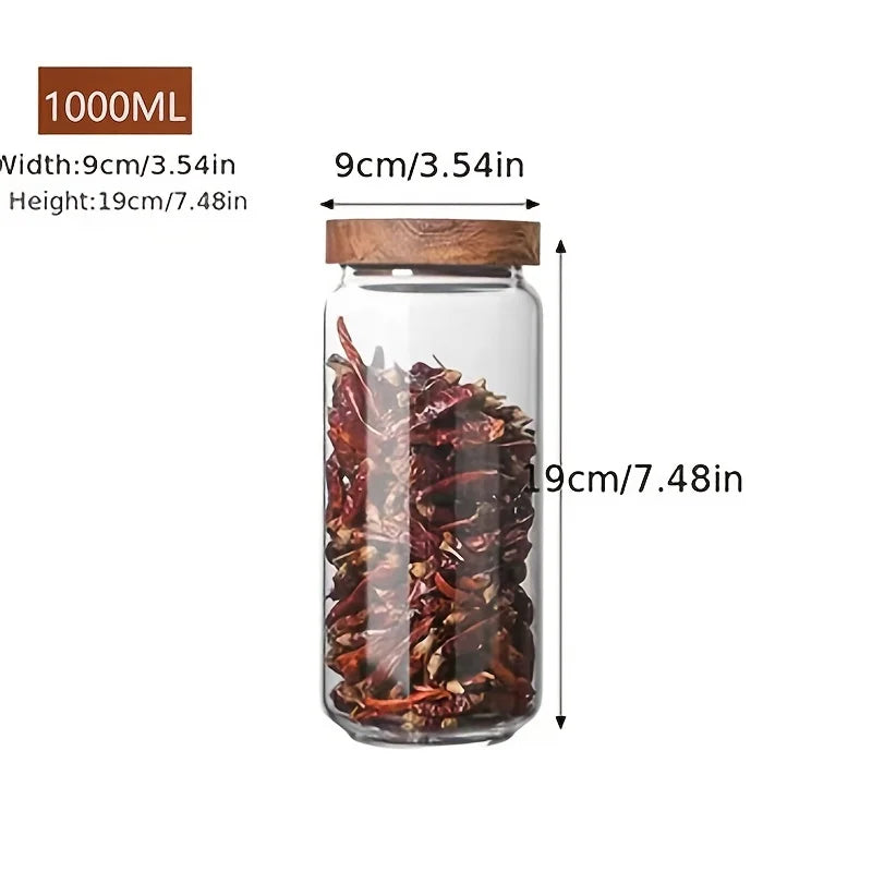 A collection of clear glass storage jars with airtight lids, ideal for organizing and preserving various kitchen staples such as pasta, grains, spices, and snacks. Their transparent design allows for easy identification of contents, while the airtight seals maintain freshness and prevent moisture intrusion. These jars not only provide practical storage solutions but also add a touch of elegance to kitchen countertops or pantry shelves