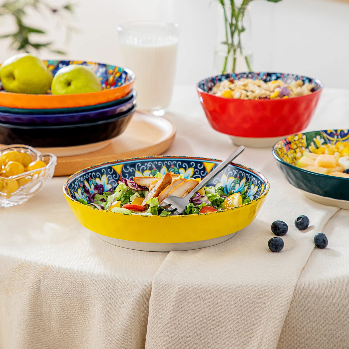 A beautiful ceramic dinnerware set, featuring a matching collection of plates, bowls, and cups with a smooth, glossy finish and elegant design. Perfect for both everyday dining and special occasions.