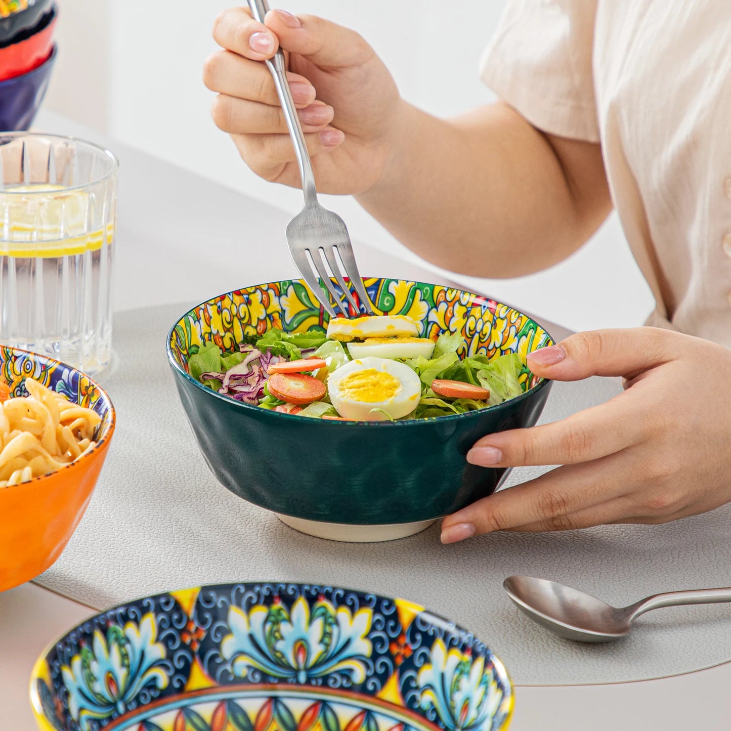 A beautiful ceramic dinnerware set, featuring a matching collection of plates, bowls, and cups with a smooth, glossy finish and elegant design. Perfect for both everyday dining and special occasions.