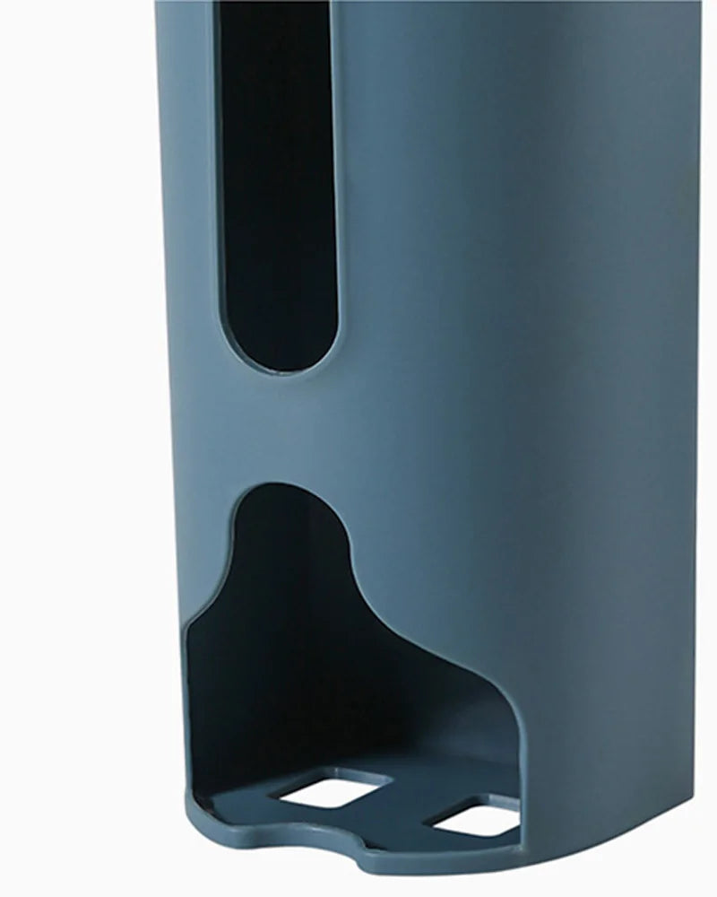 A wall-mounted plastic bag holder made of durable stainless steel with a sleek silver finish. Designed to neatly store and dispense plastic grocery bags, it features a top opening for easy insertion and a front slot for convenient retrieval, helping to keep your kitchen organized and clutter-free.