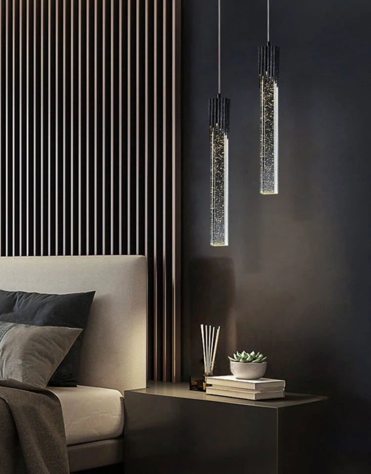 A modern luxury crystal pendant lamp featuring elegant crystal elements suspended from a sleek, contemporary fixture. Designed to add sophistication and glamour to any space, this lamp combines high-quality materials with innovative design, making it a striking focal point in both modern and traditional interiors