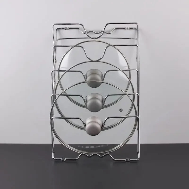 A hanging pot lid holder, designed to store pot lids efficiently by hanging them on a wall or inside a cabinet door, featuring adjustable dividers to accommodate various lid sizes, made from durable materials like metal or bamboo, and designed to save kitchen space while keeping lids organized