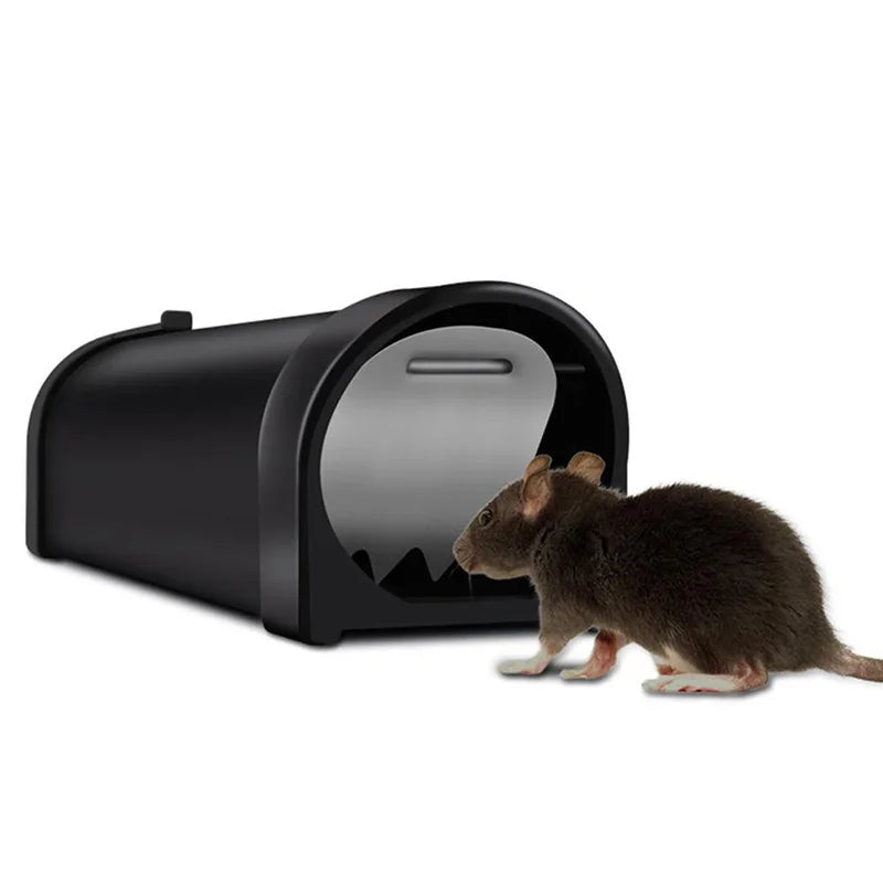 A humane mouse trap designed to safely capture and release mice without harm. The transparent plastic construction allows for easy monitoring, and ventilation holes ensure the mouse's well-being until release