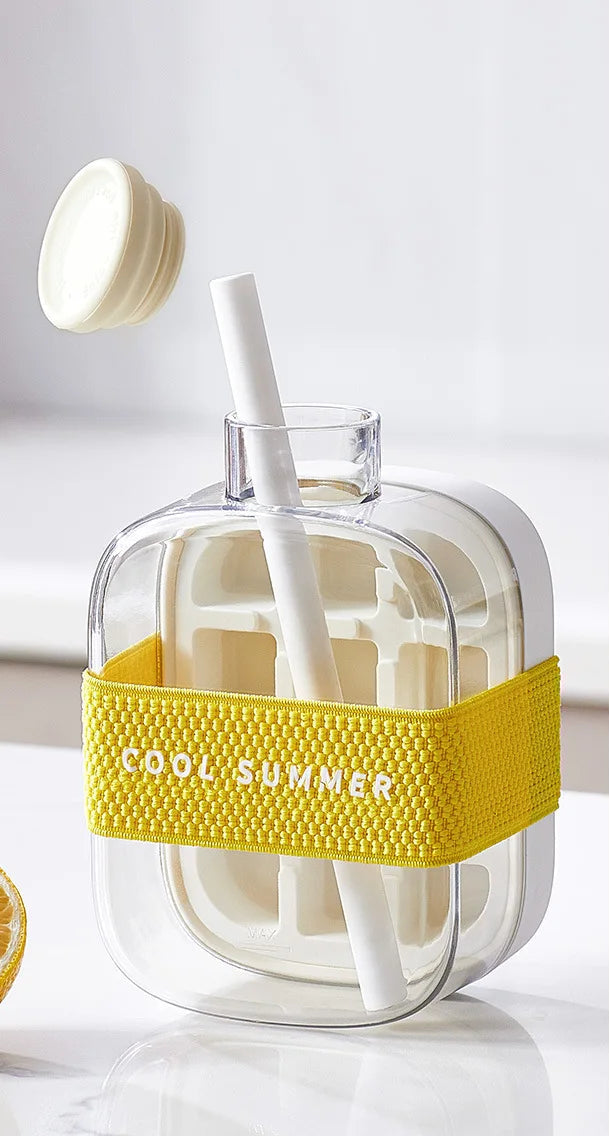 A stackable ice cube tray with a secure lid, designed for easy filling and spill-free storage, ensuring fresh and odor-free ice cubes.