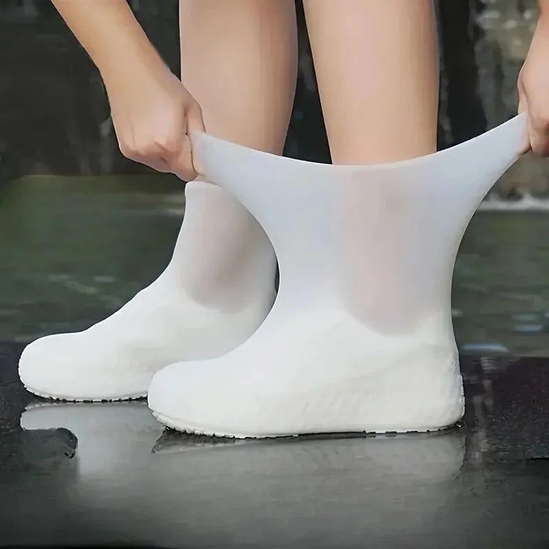 Reusable waterproof shoe covers made from durable, flexible silicone, designed to fit over various shoe sizes; feature non-slip soles for enhanced safety; easy to clean and store; ideal for protecting shoes from water, mud, and debris during outdoor activities