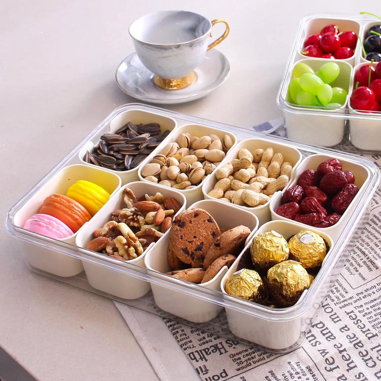 A divided serving tray storage box featuring multiple compartments, a secure lid, and a handle for easy portability; ideal for organizing and transporting snacks, fruits, nuts, or appetizers during events, picnics, or daily use