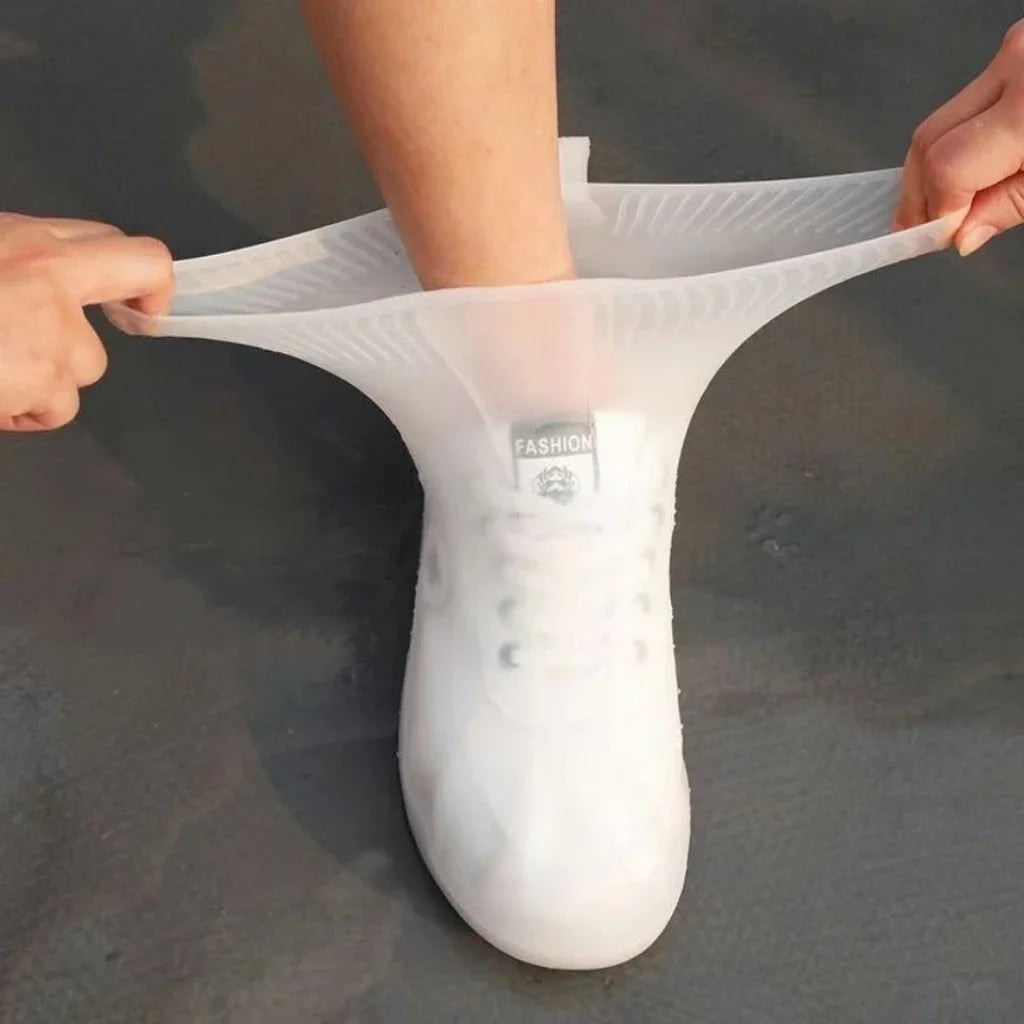 Reusable waterproof shoe covers made from durable, flexible silicone, designed to fit over various shoe sizes; feature non-slip soles for enhanced safety; easy to clean and store; ideal for protecting shoes from water, mud, and debris during outdoor activities