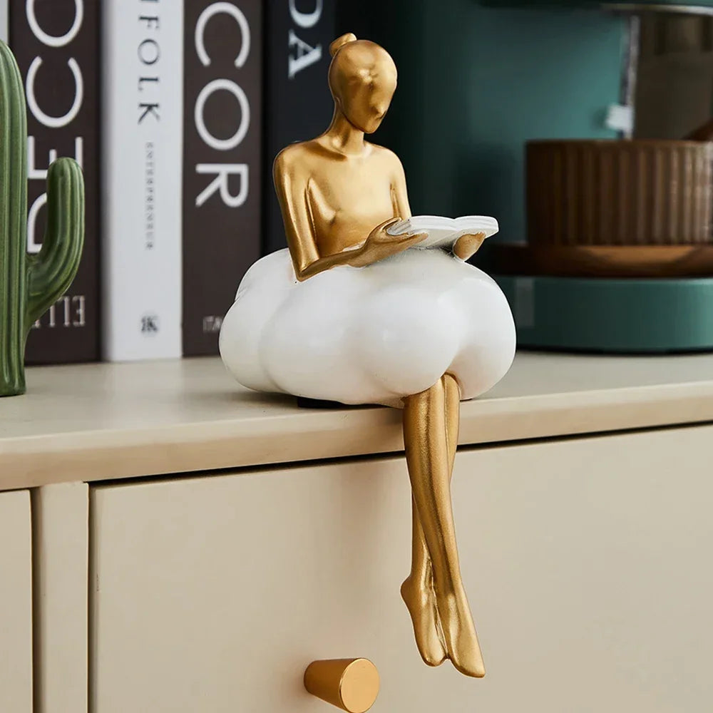 Escultura de la niña de las nubes