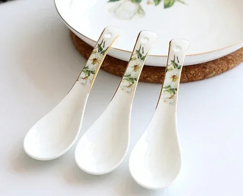 A set of bone dinnerware comprising dinner plates, salad plates, bowls, and cups, all crafted from high-quality porcelain infused with bone ash. Renowned for its exceptional whiteness, translucency, and strength, bone china offers a luxurious feel and elegant appearance. This timeless collection is perfect for enhancing both everyday meals and special occasions