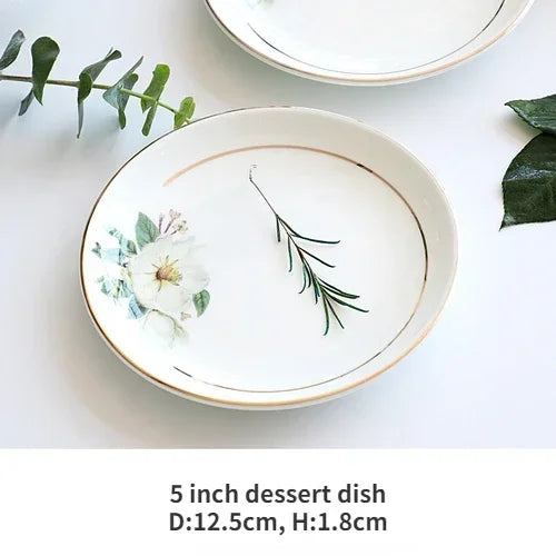 A set of bone dinnerware comprising dinner plates, salad plates, bowls, and cups, all crafted from high-quality porcelain infused with bone ash. Renowned for its exceptional whiteness, translucency, and strength, bone china offers a luxurious feel and elegant appearance. This timeless collection is perfect for enhancing both everyday meals and special occasions