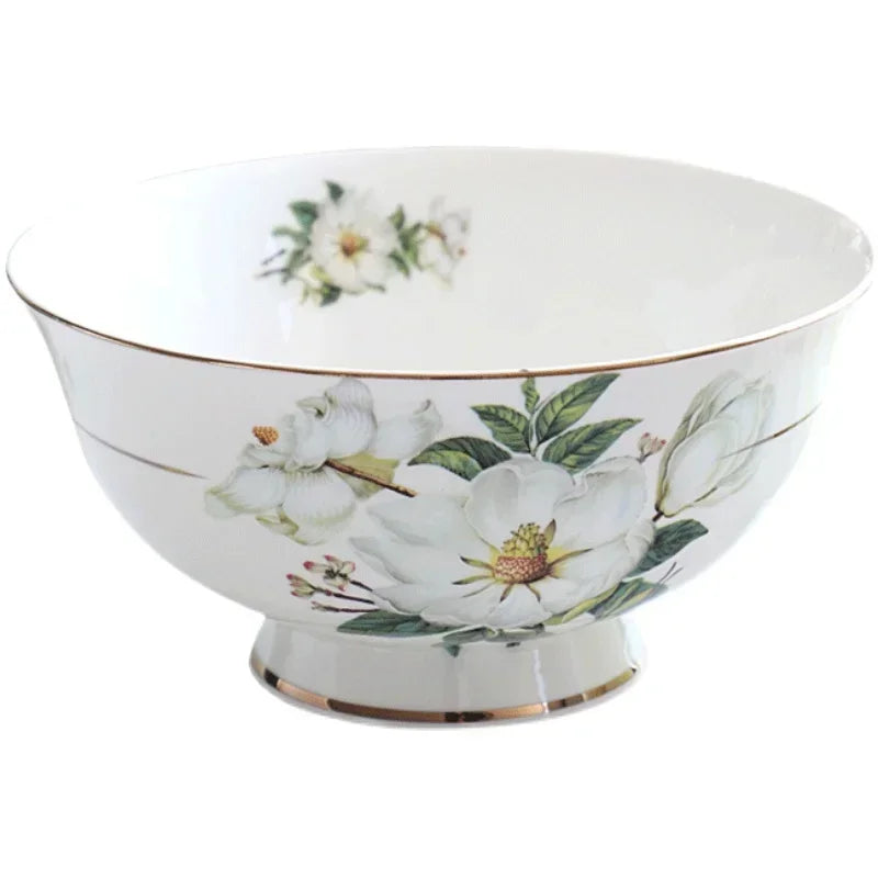 A set of bone china dinnerware comprising dinner plates, salad plates, bowls, and cups, all crafted from high-quality porcelain infused with bone ash. Renowned for its exceptional whiteness, translucency, and strength, bone china offers a luxurious feel and elegant appearance. This timeless collection is perfect for enhancing both everyday meals and special occasions