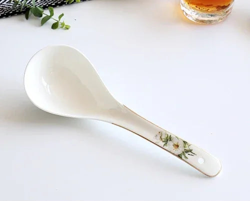 A set of bone dinnerware comprising dinner plates, salad plates, bowls, and cups, all crafted from high-quality porcelain infused with bone ash. Renowned for its exceptional whiteness, translucency, and strength, bone china offers a luxurious feel and elegant appearance. This timeless collection is perfect for enhancing both everyday meals and special occasions