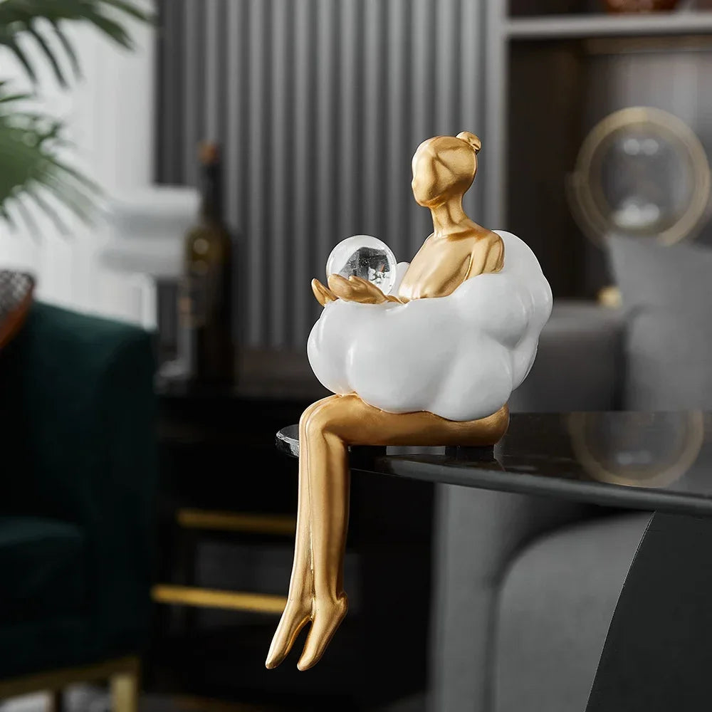 Escultura de la niña de las nubes