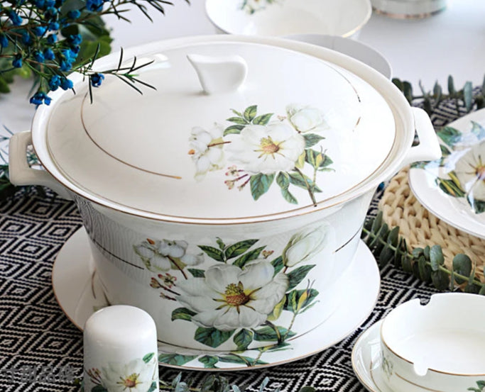 A set of bone dinnerware comprising dinner plates, salad plates, bowls, and cups, all crafted from high-quality porcelain infused with bone ash. Renowned for its exceptional whiteness, translucency, and strength, bone china offers a luxurious feel and elegant appearance. This timeless collection is perfect for enhancing both everyday meals and special occasions