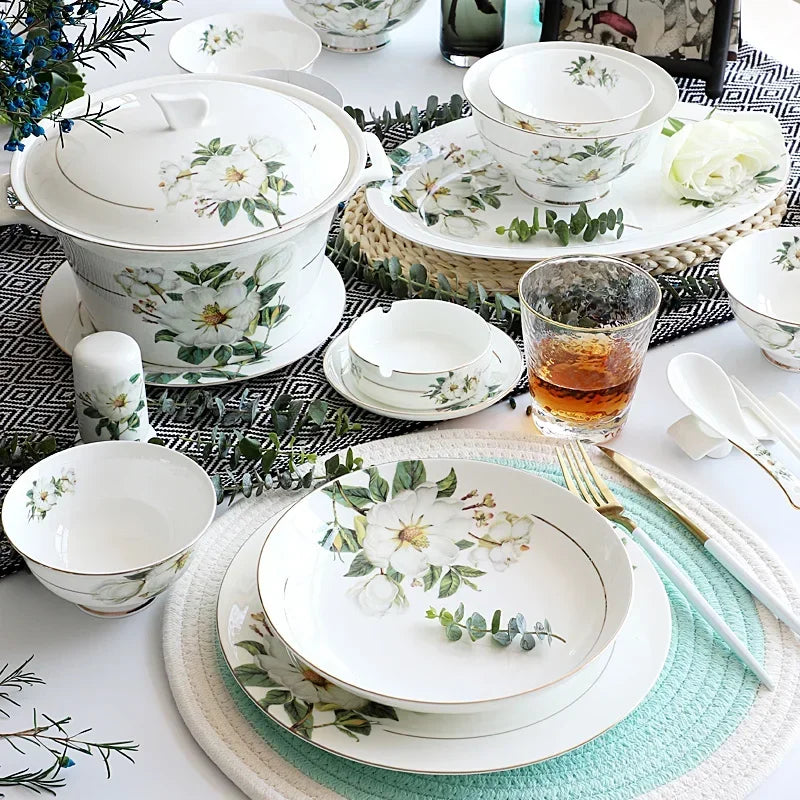 A set of bone china dinnerware comprising dinner plates, salad plates, bowls, and cups, all crafted from high-quality porcelain infused with bone ash. Renowned for its exceptional whiteness, translucency, and strength, bone china offers a luxurious feel and elegant appearance. This timeless collection is perfect for enhancing both everyday meals and special occasions