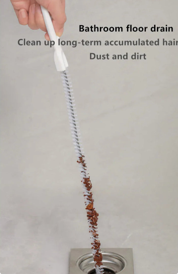A flexible pipe dredging brush designed to clean the interior of pipes and drains. It features durable bristles attached to a long, bendable handle, allowing it to navigate through curves and remove debris, ensuring optimal water flow