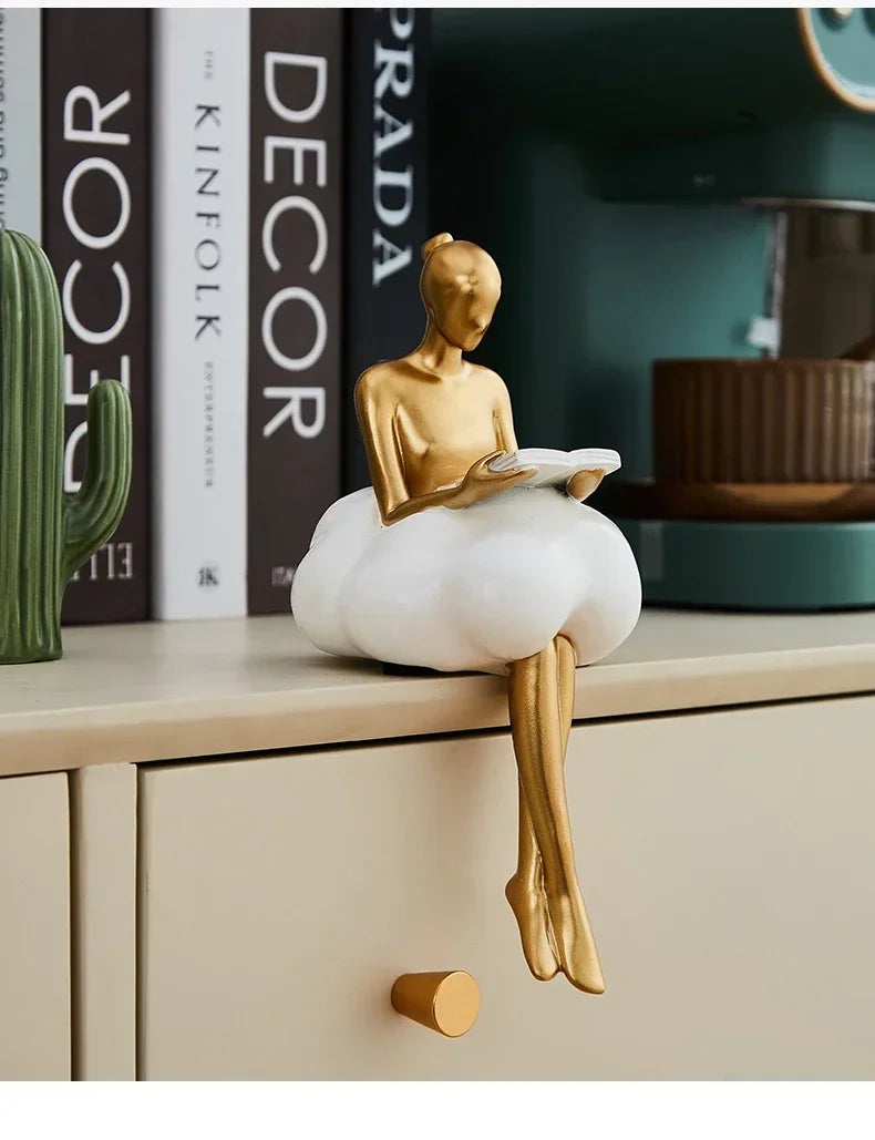Escultura de la niña de las nubes