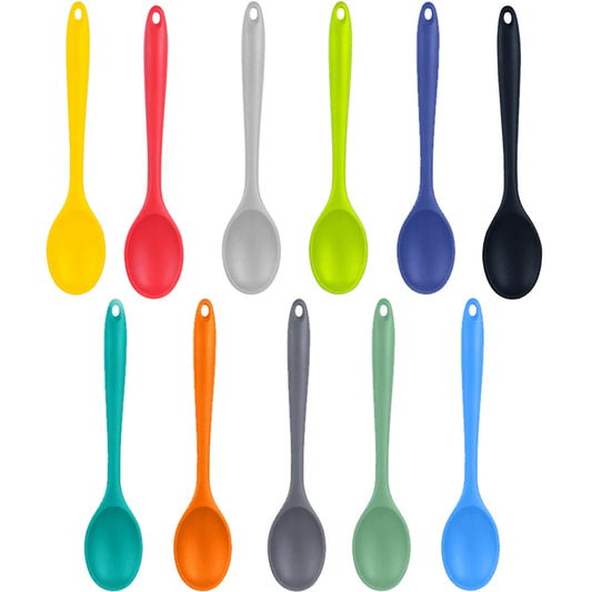 A soft silicone spoon designed for stirring, featuring a flexible, heat-resistant head that protects non-stick cookware. The ergonomic handle ensures a comfortable grip, making it ideal for mixing, scooping, and serving a variety of dishes