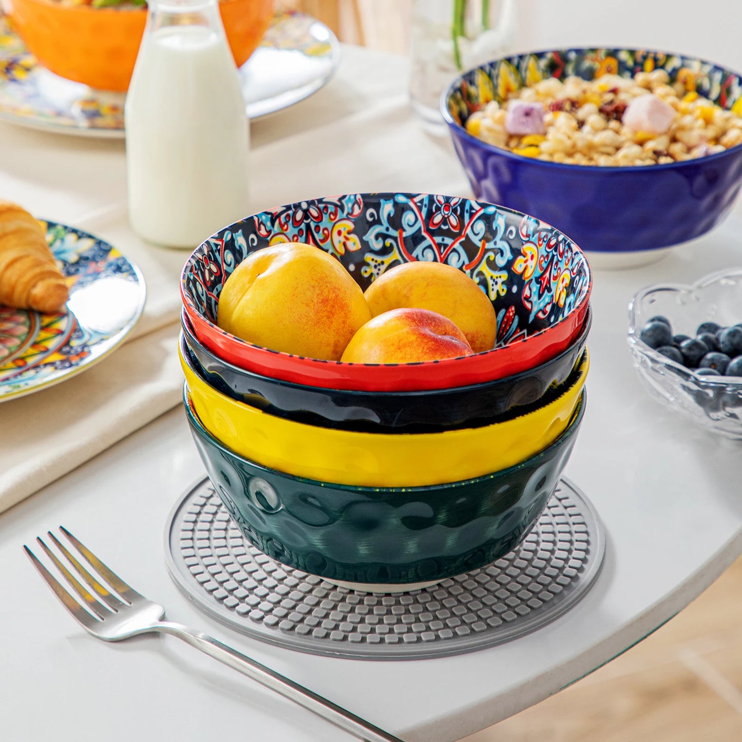 A beautiful ceramic dinnerware set, featuring a matching collection of plates, bowls, and cups with a smooth, glossy finish and elegant design. Perfect for both everyday dining and special occasions.