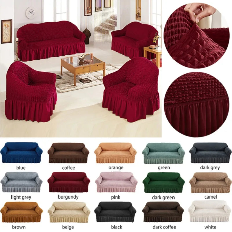 Stretchable sofa cover in a neutral tone, fitting snugly over a three-seater couch, providing protection and a refreshed look to the living room furniture