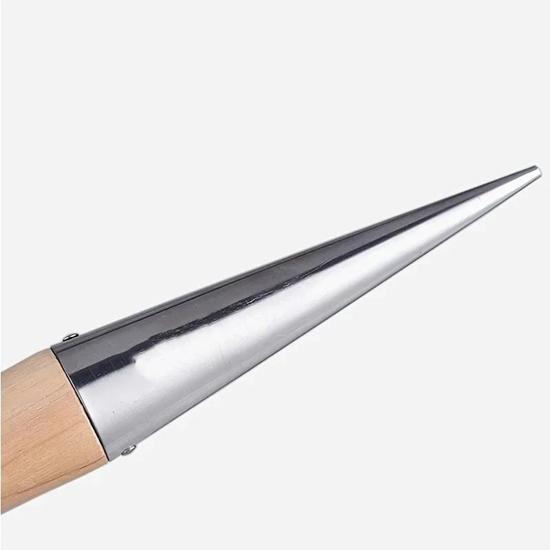 A T-shaped hole puncher seeder made of stainless steel, featuring a wooden handle; designed to create precise holes in soil for planting seeds or bulbs; ensures accurate seed placement and depth for optimal growth