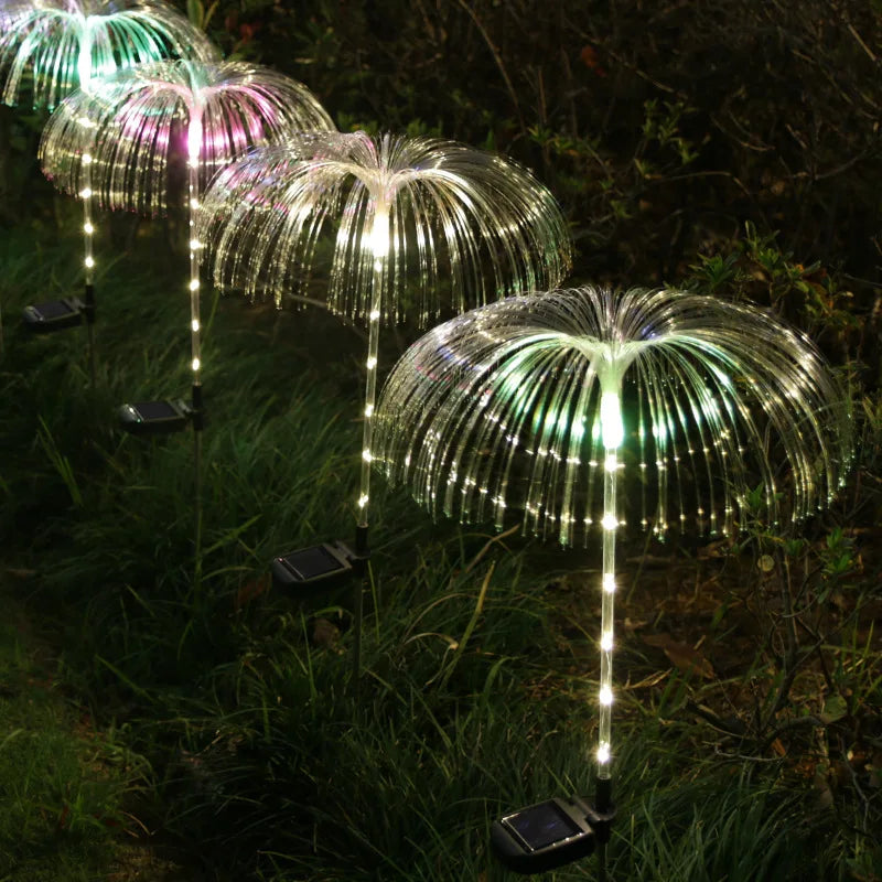 A solar-powered fiber optic lamp featuring multi-color illumination. The lamp harnesses sunlight during the day to power vibrant, color-changing fiber optic strands at night, creating a mesmerizing display suitable for gardens, patios, or outdoor pathways.