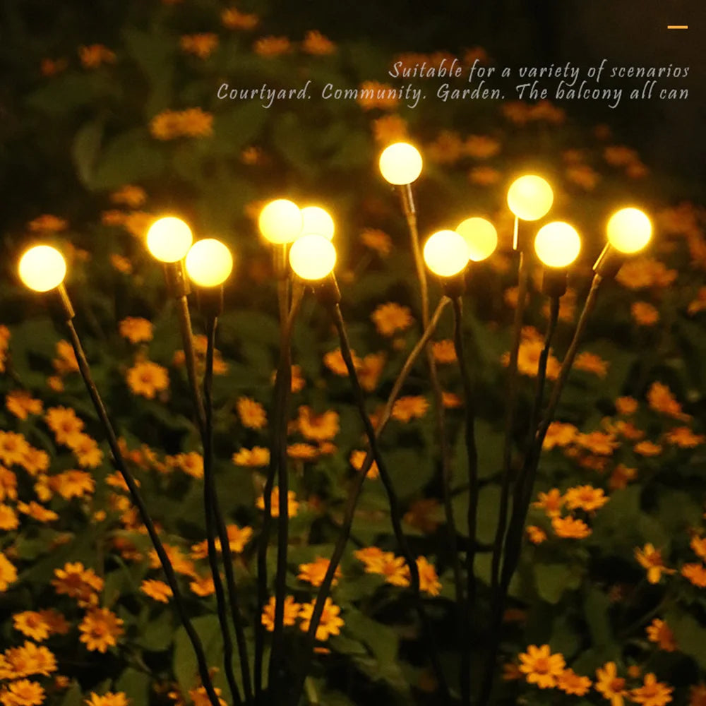 A collection of solar-powered garden lights illuminating a pathway at dusk. The lights, designed in various styles such as lanterns, stakes, and string lights, harness sunlight during the day and emit a warm, inviting glow in the evening, enhancing the ambiance of the outdoor space