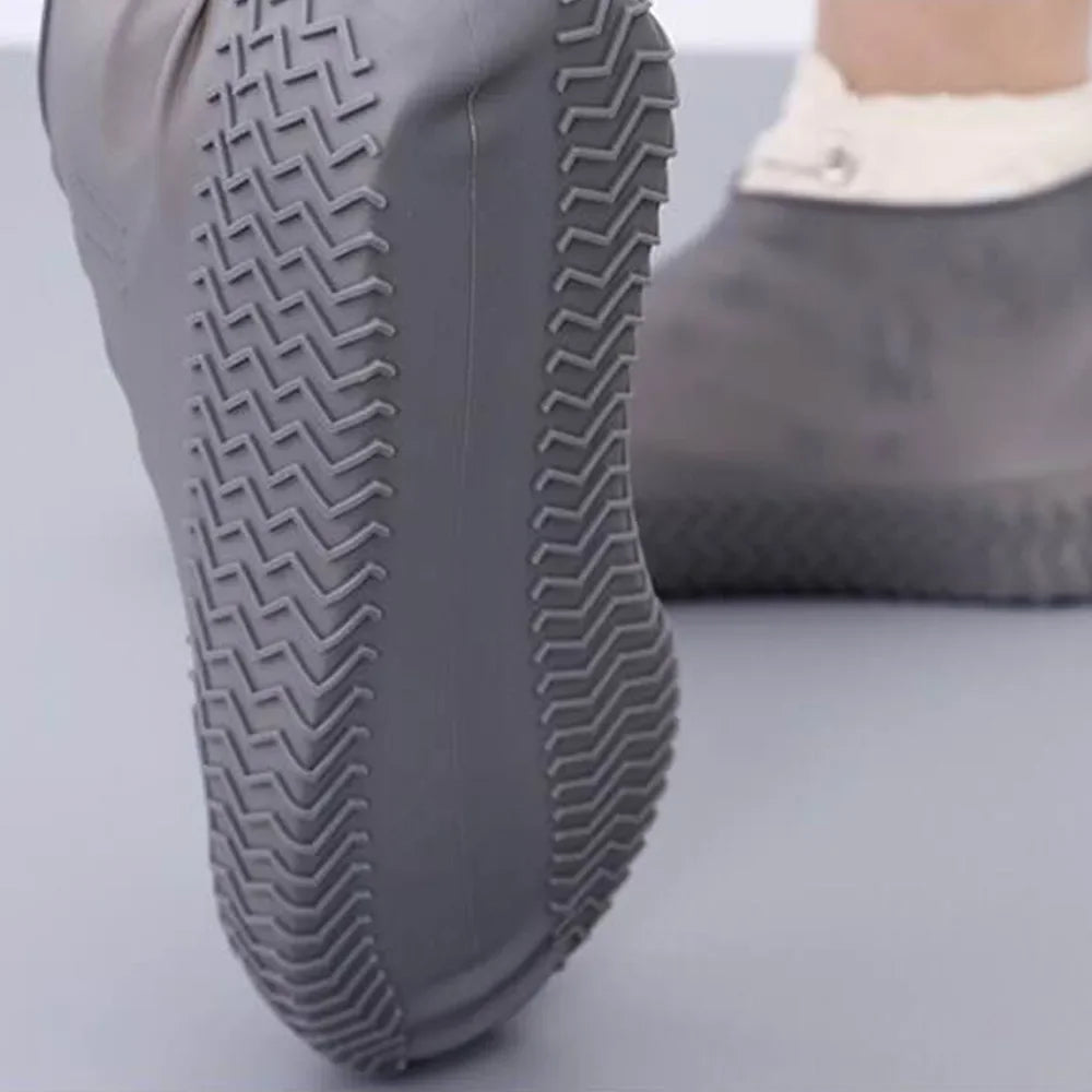 Reusable waterproof shoe covers made from durable, flexible silicone, designed to fit over various shoe sizes; feature non-slip soles for enhanced safety; easy to clean and store; ideal for protecting shoes from water, mud, and debris during outdoor activities