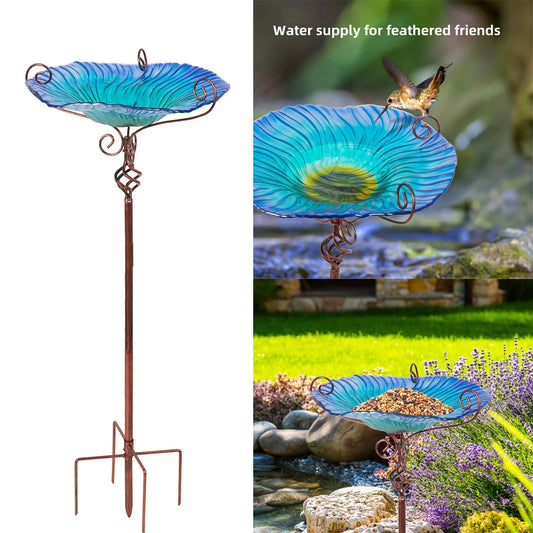 A decorative garden birdbath featuring a glass bowl with a flower design, mounted on a tall pedestal. The vibrant colors and intricate patterns attract birds while adding a touch of elegance to outdoor spaces.