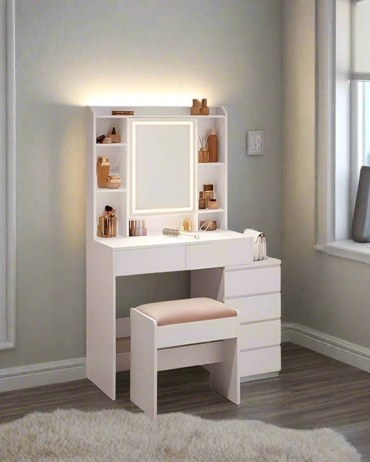 A modern vanity table featuring a sleek design, equipped with a built-in LED-lit mirror offering adjustable brightness settings. The table includes multiple drawers and shelves for organized storage of cosmetics and accessories, complemented by a smooth tabletop for a stylish and functional addition to any bedroom or dressing area.