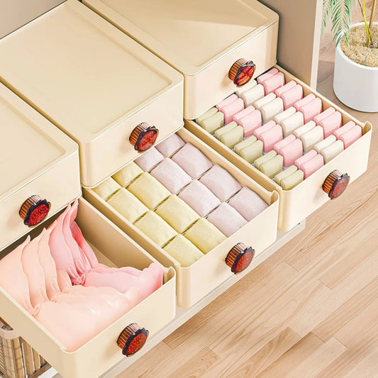 A set of foldable drawer organizers designed for underwear storage, featuring multiple compartments to neatly separate and organize socks, bras, and panties; made from breathable fabric to protect garments and maintain freshness