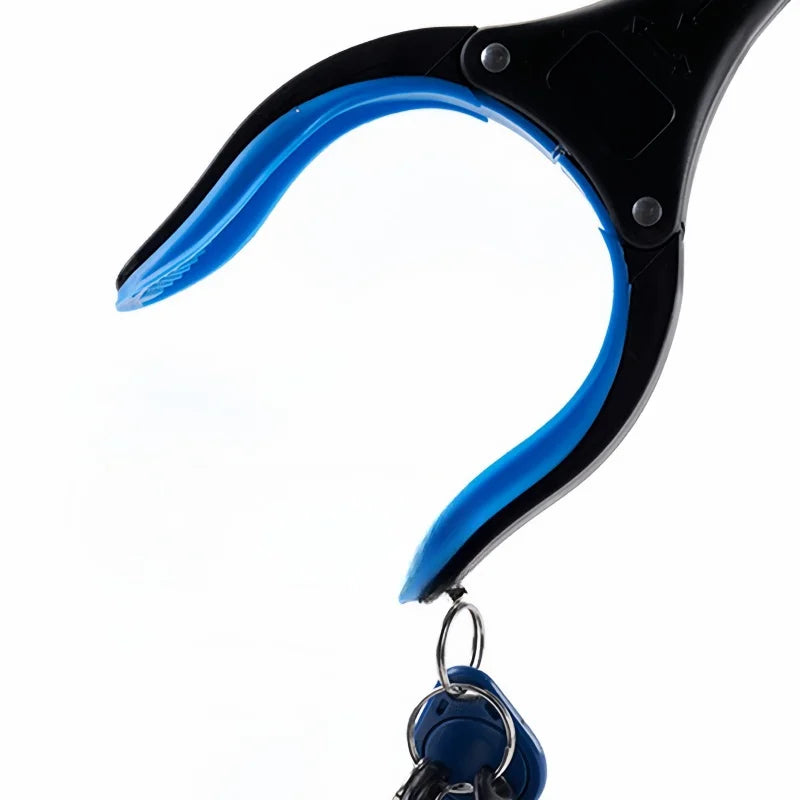  "A foldable reach extender, commonly known as a grabber or helping hand, designed to assist users in picking up objects without bending or stretching. The tool features a lightweight, collapsible aluminum shaft approximately 32 inches long, with an ergonomic handle and a trigger mechanism that controls the rubberized gripping jaws at the opposite end. Ideal for individuals with limited mobility, it aids in retrieving items from high shelves or the ground